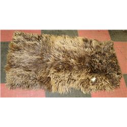 SEWN TOGETHER UNKNOWN  ANIMAL HIDE RUG