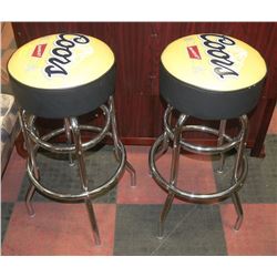 PAIR OF COORS BANQUET STOOLS.