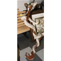 MOUNTED BOA  AFTER WEASEL ON BRANCH