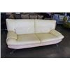 Image 1 : BEIGE LEATHER SOFA, VISBLE WEAR