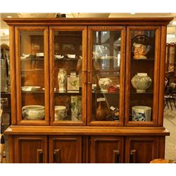 A glass display cabinet .