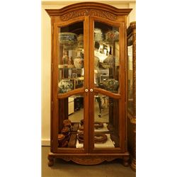 A glass display cabinet .