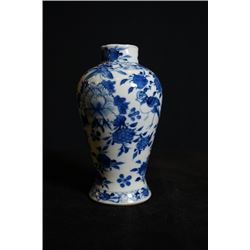 A Small Blue-and-White "Flora" Vase.