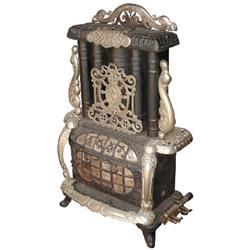 The Estate Triple Effect parlor stove, mfgd. by The Estate Stove Co,  F & L Kahn-Hamilton, O., 1895,