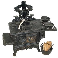 Miniature toy stove, Crescent, cast iron w/4 burners, complete w/kettle, pot, skillet, scoop & lifte