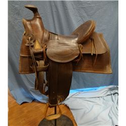 Main & Winchester loop seat, slick fork saddle, sold by E. J. Owenhouse, Bozeman, Montana Territory