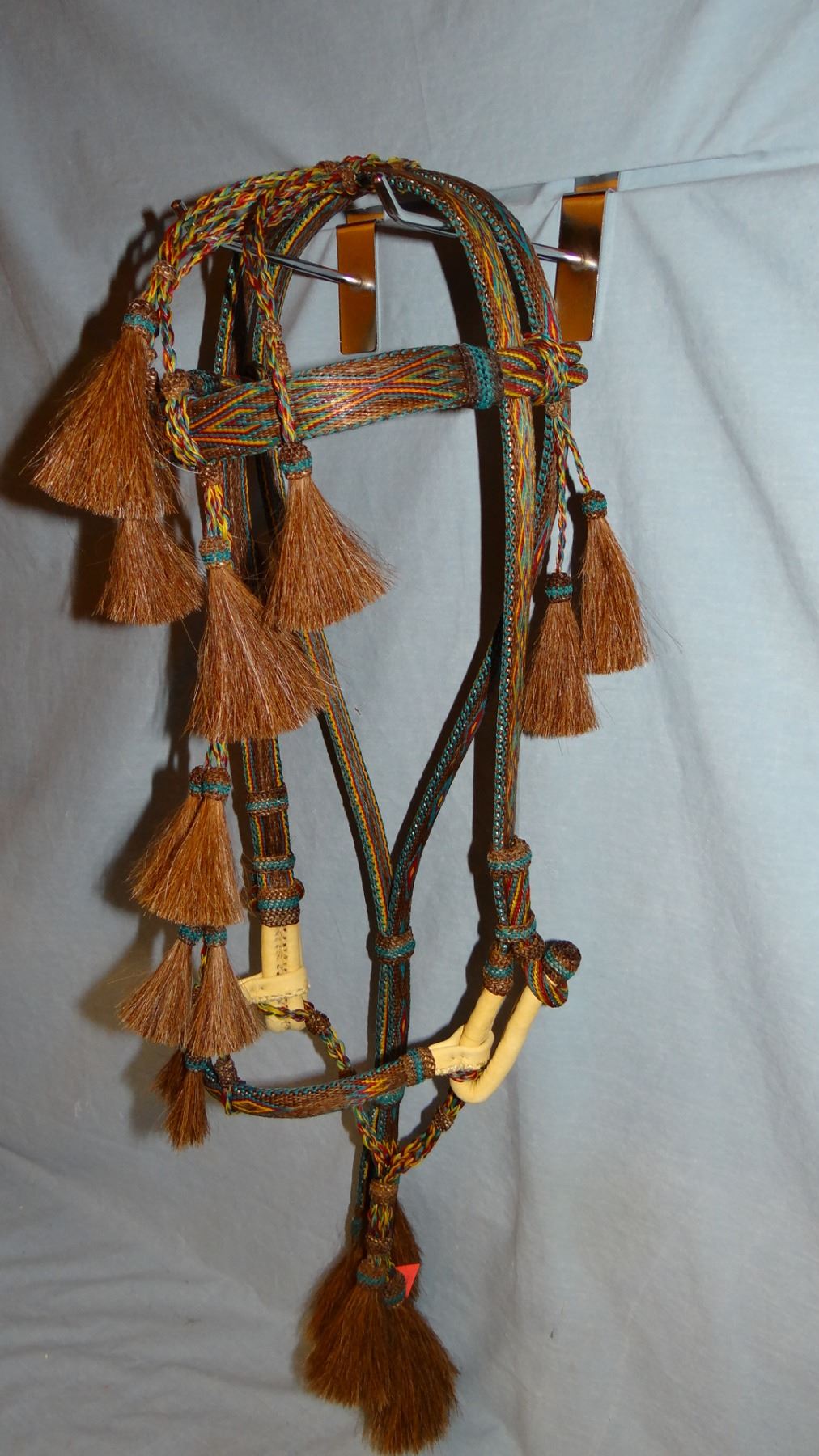 Hitched horse hair bridle, S. Dak. State Prisonmade, elk hide accents