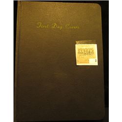 Used black album for First Day Covers. No covers included.