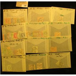 Group of higher value World Stamps. All attributed and priced to sell at over $500.00.