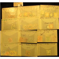 Group of higher value World Stamps. All attributed and priced to sell at over $500.00.