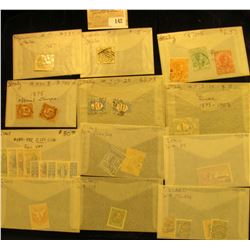 Group of higher value World Stamps. All attributed and priced to sell at over $500.00.