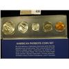 Image 2 : 1964 American Patriots Coin Set Cent to Silver Half-Dollar in a Snaptight case, all BU, and from the