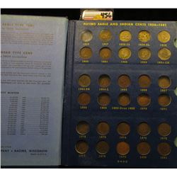 1857-1909 Partial Set of Indian Head Cents in a blue Whitman folder. Includes three Flying Eagle Cen