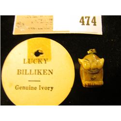 Genuine "Lucky Billiken Genuine Ivory" with a small Gold Nugget belly button.