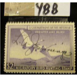 1950 Two  Dollar Federal Migratory Waterfowl Stamp, signed. RW17 stored in a three-ring binder.