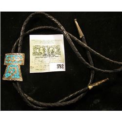 Western Style Bolo Tie with crushed Turquoise Indian Motif design in Sterling Silver.