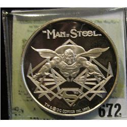 "Man of Steel", "Cartoon Celebrities Made in USA by AMC One Troy Oz. .999 Fine Silver". Depicts Supe