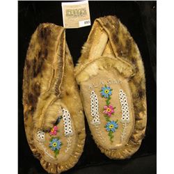 Pair of Beaded leather and fur Moccasins. "Alaska" Beaded.