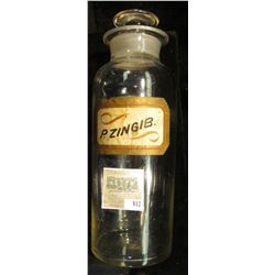 Large 12 1/2" x 4 1/4" Clear Glass Apothecary Jar with label "P. Zingib" and glass stopper.