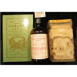 Metal Quack Medicine Tin from Clinton, Iowa 3.5" x 3.5" x 6" labeled "Fuller's Earth"; a amber bottl