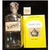 Image 1 : Large 10" x 3 1/4 Apothcary Jar with glass Stopper, no contents.  Labeled "TR. Capsici"; & a hardbou
