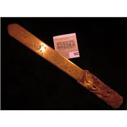 Interesting engraved and sculptured Knife with floral design and Storks. Brass. 11 1/4" in length.