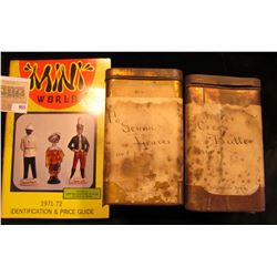 (2) Pharmaceutical Tins 6" x 3 3/4" x 3 3/4" one labeled "Cocoa Butter" with some contents, the othe