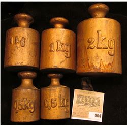 Five-piece Set of Heavy Brass Weights, which includes (2) 0.5 KG, (2) 1 Kg, & a 2 Kg. Stored in a li