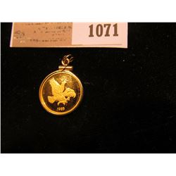 1071 _ Small Felt Bag with a 1985 Iowa Hawkeyes 1/10 oz. Proof Gold Piece depicting Herky the Hawk i