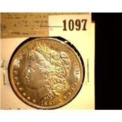 1097 _ 1887 P Morgan Silver Dollar, Choice BU 64.