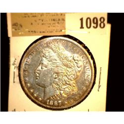 1098 _ 1887 S Morgan Silver Dollar, AU Bag marks.