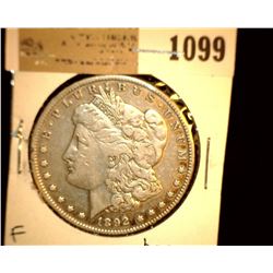 1099 _ 1892 S Morgan Silver Dollar, Fine. Baggy.