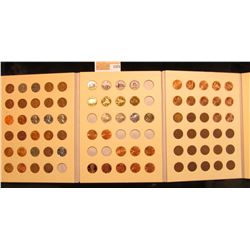 1375 _ A Littleton Lincoln cent folder with an unusual assortment of Wheat Cents, Steel Cents, Ename