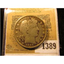 1389 _ 1894 O Barber Half Dollar, VG. Some weird stuff going on near the Date on this piece, buy as 