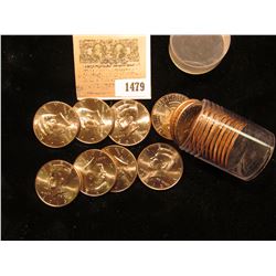 1479 _ 2013 P Solid-date Roll of Kennedy Half Dollars. Gem BU, stored in a plastic tube.
