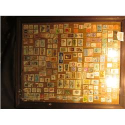 1599 _ 20" X 24" Picture Frane with about 200 Used US. Stamps.