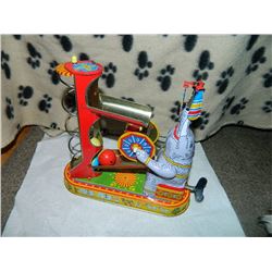 METAL WIND-UP TOY - ELEPHANT WITH BALLS