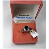 12)  STERLING SILVER & OVAL RUBY RING