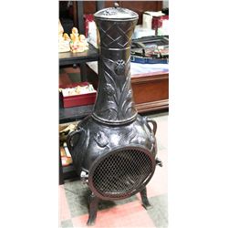 ORNATE FIREPLACE WITH GRILLS