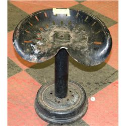 ANTIQUE TRACTOR SEAT ON STAND