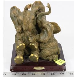 MOTHER AND BABY ELEPHANT FIGURE OUT OF RUBY'S