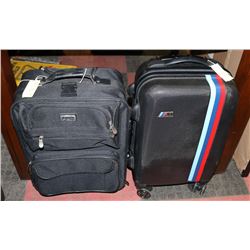2 SMALL BLACK SUITCASES