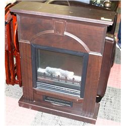 SMALL ELECTRIC FIREPLACE WITH MANTEL.