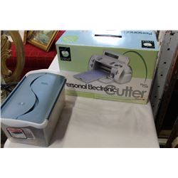 CRICUT PERSONAL ELECTRIC CUTTER IN BOX W/ ACCESSORIES AND EXTRA TOOLS