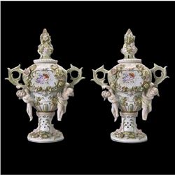 Pair of Porcelain Cherubs & Floral Vases