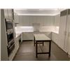 Image 1 : Approx. 11 White Upper Cabinets w/ Melamine Shelving 40" H & 30" H (Width Measurements Listed)