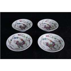 Four small "Flora and Butterflies" dishes.