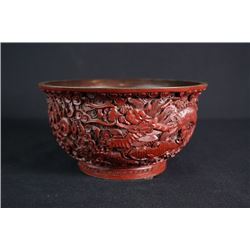 A Large Carved Red Lacquer  Dragon and Cloud  Bowl.