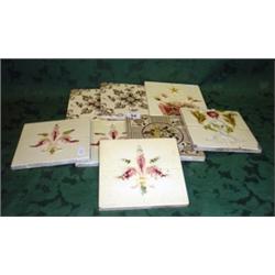 Eight glazed late 19c ceramic tiles some embossed with flowers 6" x 6" square