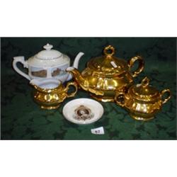 Continental gilt teapot matching sugar and jug plus another commemorative teapot and plate